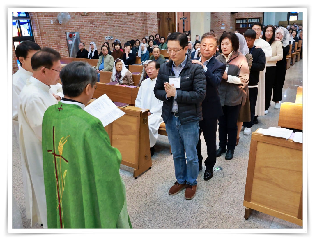 251102_받아들이는예식 (32).jpg