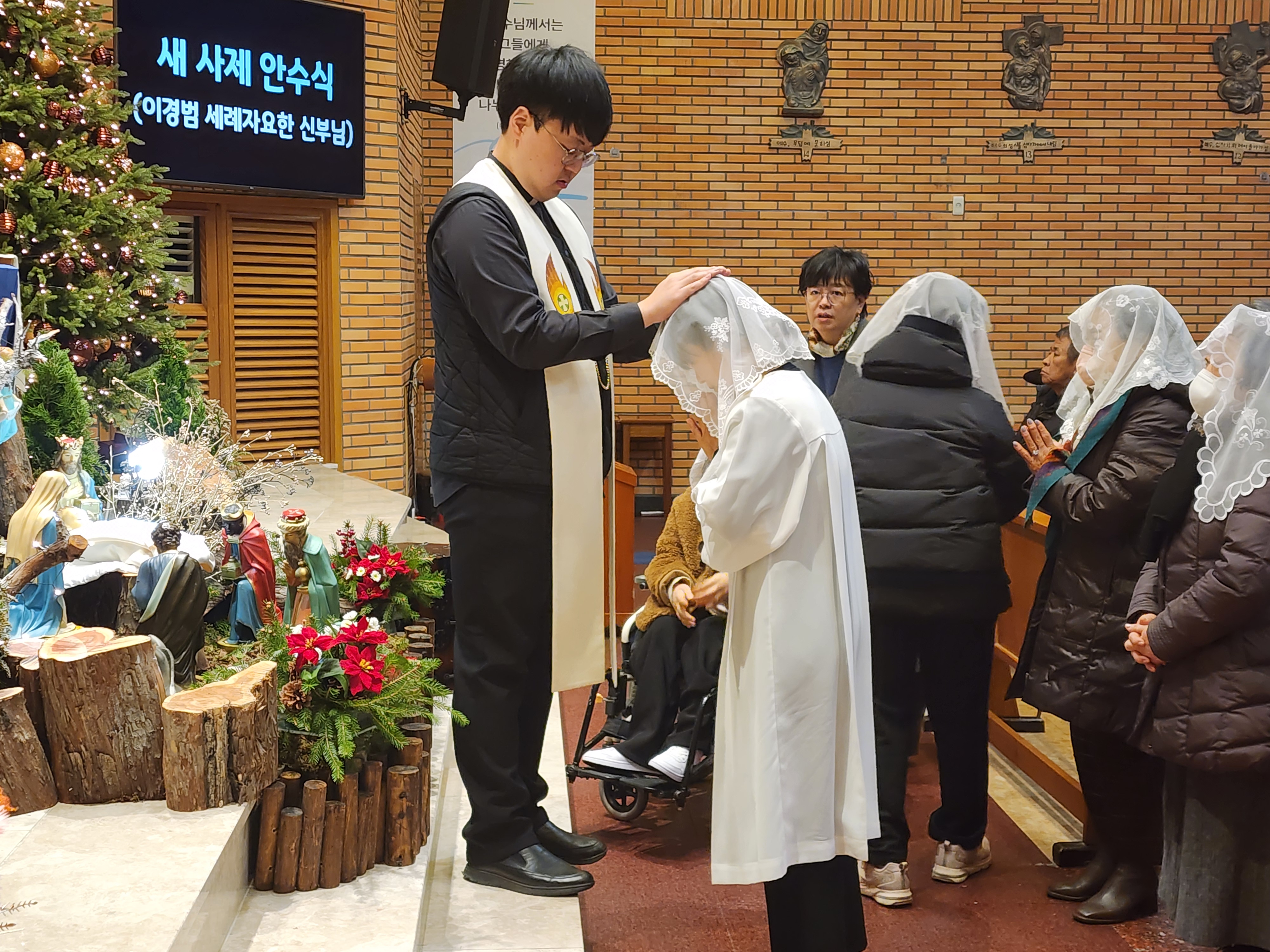 새 사제 이경범서례자요한신부님첫미사 (4).jpg