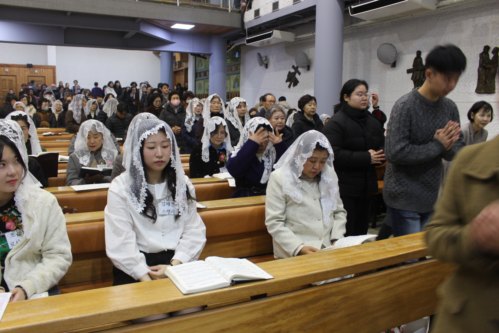 251225 성탄대축일 낮미사_세례자분들 (13).JPG