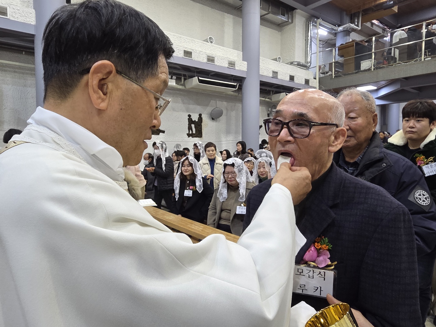251225 성탄대축일 낮미사_첫영성체 (23).jpg