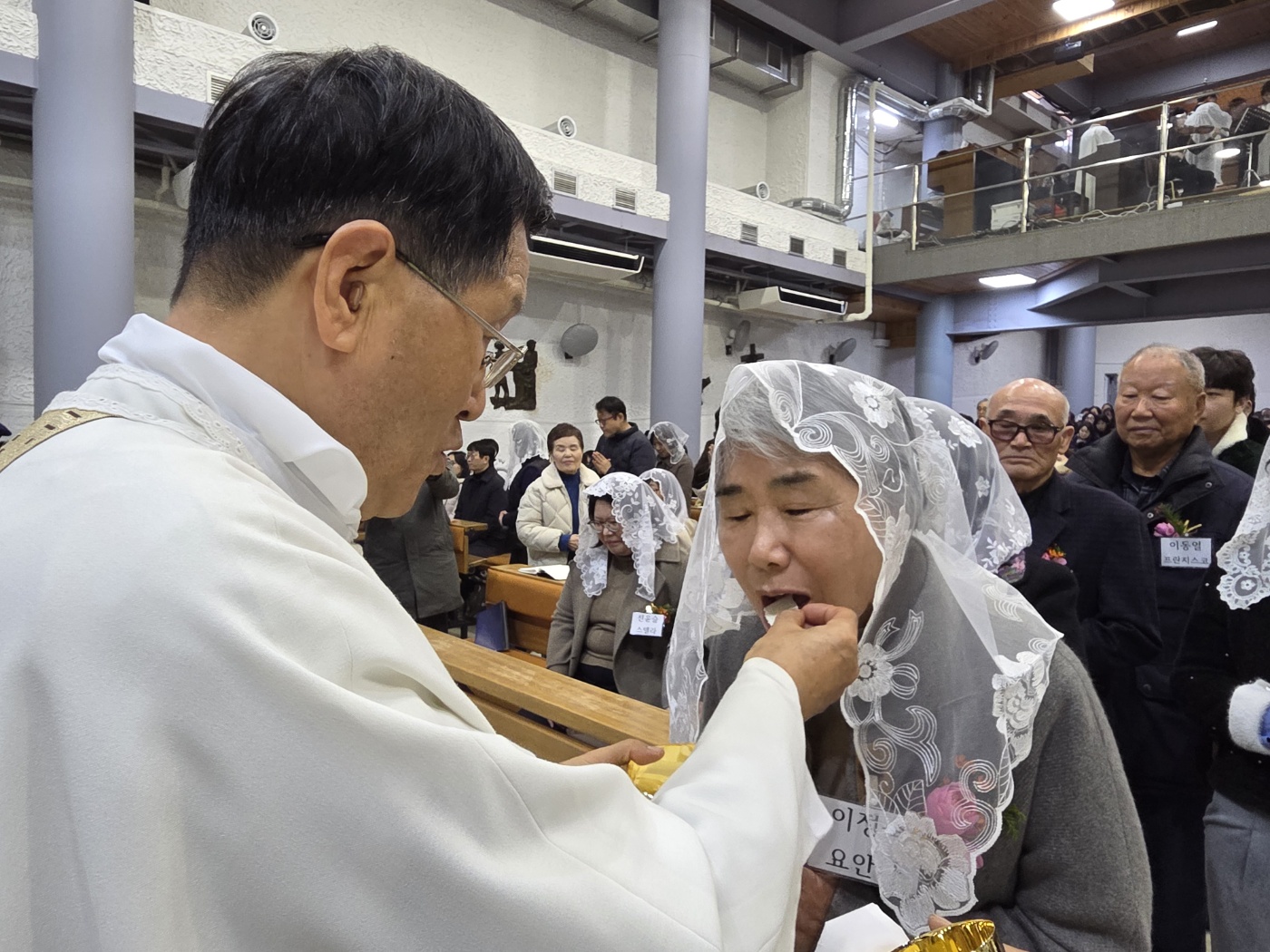 251225 성탄대축일 낮미사_첫영성체 (26).jpg