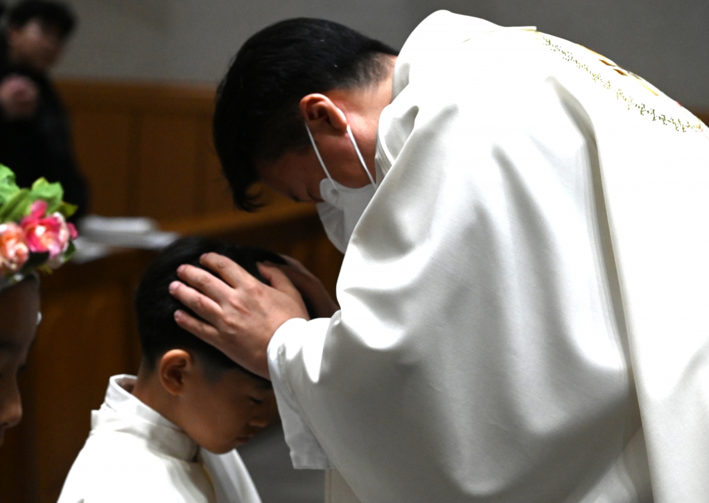 2025년11월22일-첫영성체박지호안수.JPG